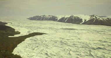 CGI Remote Arctic with ice formations and rugged mountains under clouds video