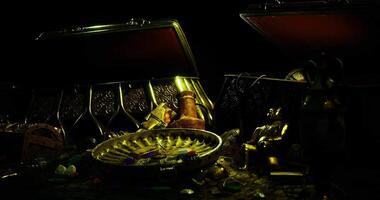 CGI Treasure chests filled with ancient artifacts and colorful gemstones video