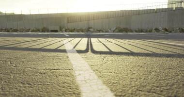 CGI Shadows and textures on a deserted parking lot during sunset video