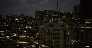 CGI Night view of a bustling urban skyline illuminated by city lights video