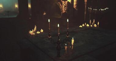 CGI Flickering candles create an eerie atmosphere in an ancient setting video
