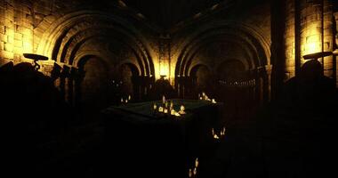 CGI Ancient stone chamber illuminated by flickering candles in a dark setting video