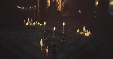 CGI Candlelit altar in an ancient, dimly lit space with glowing ambiance video