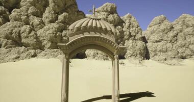 CGI Intricate archway stands alone in a vast sandy desert landscape under clear sky video