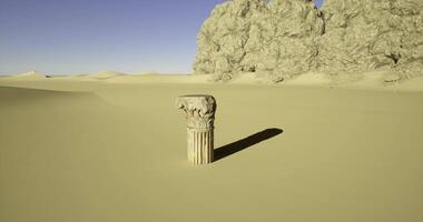 CGI Ancient column standing alone in a desert landscape at sunset video