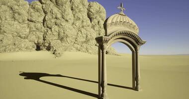 CGI Intricate archway stands alone in vast desert landscape under clear sky video