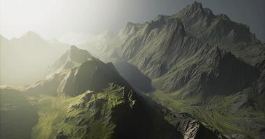 CGI Spectacular mountain landscape illuminated by soft sunlight video