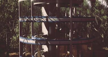 CGI Innovative architectural design of a modern multi level structure in nature video