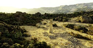CGI Exploring a mystical stone statue in a rugged landscape during daylight video