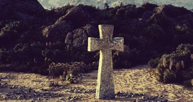CGI Granite cross in a serene landscape of rocks and greenery video