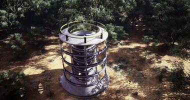 CGI Unique construction structure surrounded by dense trees in a natural landscape video