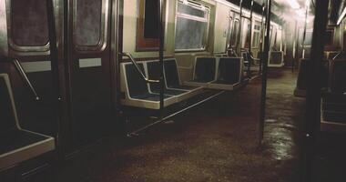 CGI Empty subway car in a dimly lit underground station during nighttime video