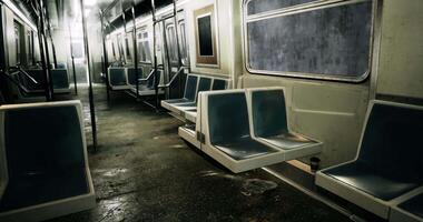 CGI Abandoned subway train interior with wet floor and empty seats at night video