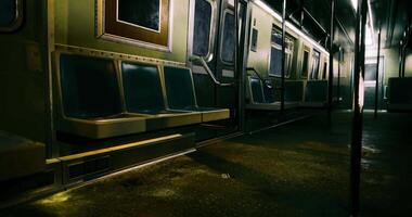 CGI Empty subway car with seats illuminated by dim overhead lights video