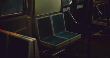 CGI Empty public transport seats illuminated by dim light at night video