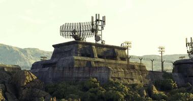 CGI Weather monitoring station with communication towers in mountainous terrain video