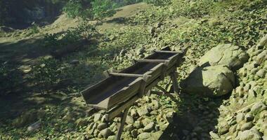 CGI Wooden structure for water transportation in a forested area during daytime video