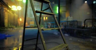 CGI Ladder in urban setting illuminated by neon lights during nighttime video