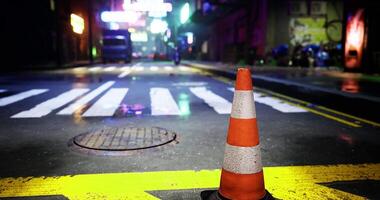 CGI Traffic cone stands on an empty neon lit street at night video