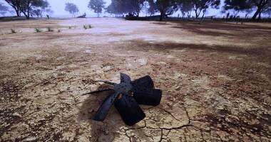 CGI Dried landscape with metal object resting on cracked earth in quiet area video