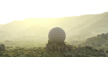 CGI Eerie landscape of a large dome structure in a desert during sunrise video