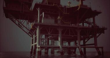 CGI Oil rig structure supported by sturdy pillars in calm offshore waters video