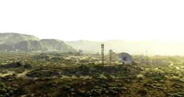 CGI Landscape with communication towers and satellite dishes under bright sky video