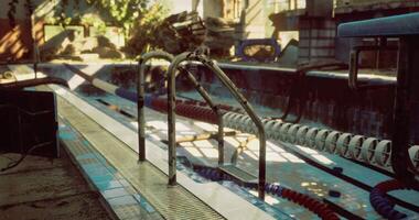 CGI Old pool with rusty railings and faded tiles in a deserted outdoor area video