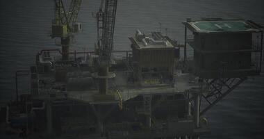 CGI Oil rig operating offshore during late evening hours with lights visible video