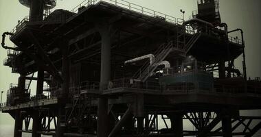 CGI Oil rig under moody skies during late evening offshore operations video