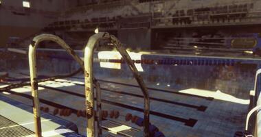 CGI Old pool with worn ladder and empty lanes under sunlight video