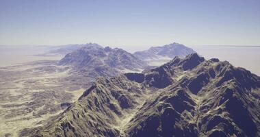 CGI Captivating mountain range under clear blue sky in remote landscape video