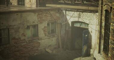CGI Abandoned warehouse with cracked walls and broken windows in a deserted area video