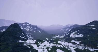 CGI Beautiful mountain landscape with snow patches and valleys in the distance video