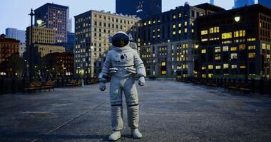 CGI Astronaut in a city park during dusk with skyline in the background video