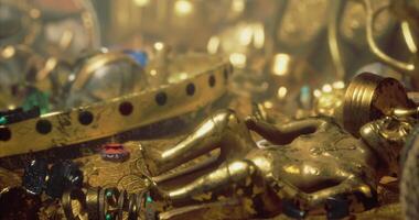 CGI Intricate treasure trove filled with golden artifacts and jewels video