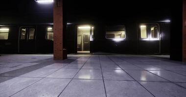 CGI Empty subway platform at night with illuminated train doors in sight video
