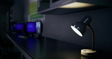 CGI Modern desk lamp illuminating workspace in a tech environment at night video