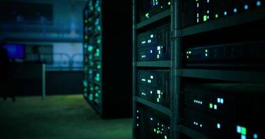CGI Data center filled with servers and glowing lights at nighttime video