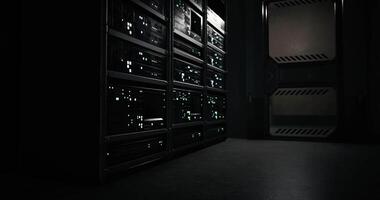 CGI Mysterious data center with glowing servers in dark corridor setting video