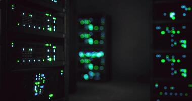 CGI Data center filled with illuminated servers and blinking indicators at night video