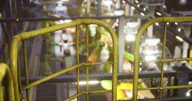 CGI Industrial automation in a modern factory with robotic assembly lines video