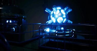 CGI Bright blue light source illuminating an industrial space at night video