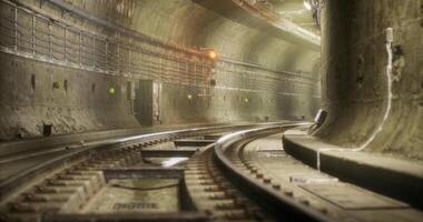 CGI Exploring the curves of an underground rail tunnel at dusk video