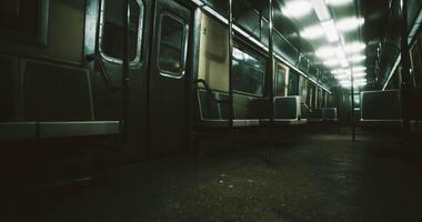 CGI Abandoned subway train interior illuminated with dim overhead lights video