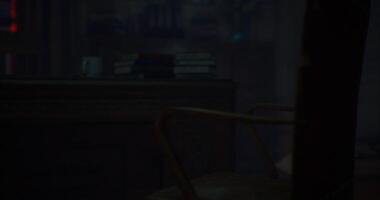 CGI A darkened study with a desk, books, and a coffee cup at night video