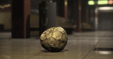 CGI Old soccer ball resting on the floor of an empty subway station video