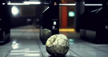 CGI Soccer ball rests on a subway platform during evening rush hour video