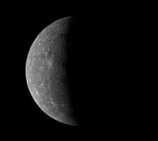 Planet Mercury in phase, isolated on black background. photo
