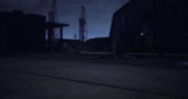 CGI Nighttime industrial setting with distant structures and low visibility video